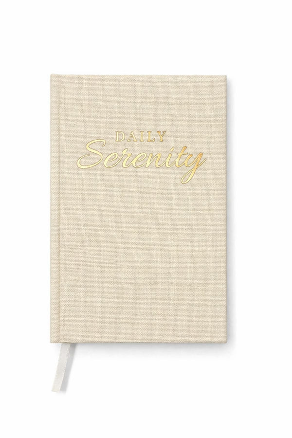 Beige notebook with 'Daily Serenity' text on a white background